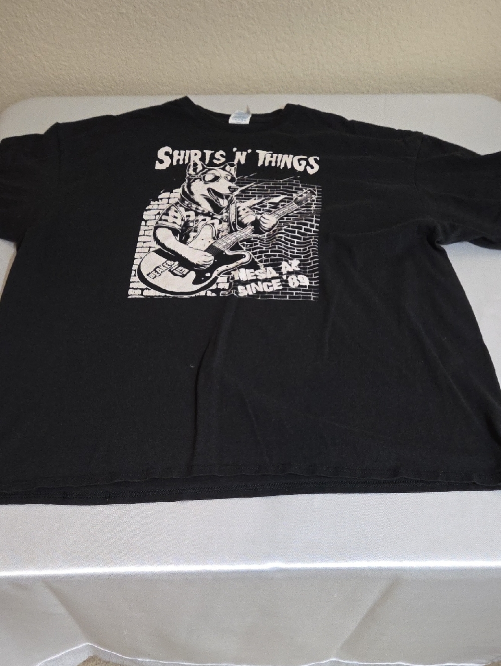 Delta Black Short-Sleeve Graphic Tee with White Print